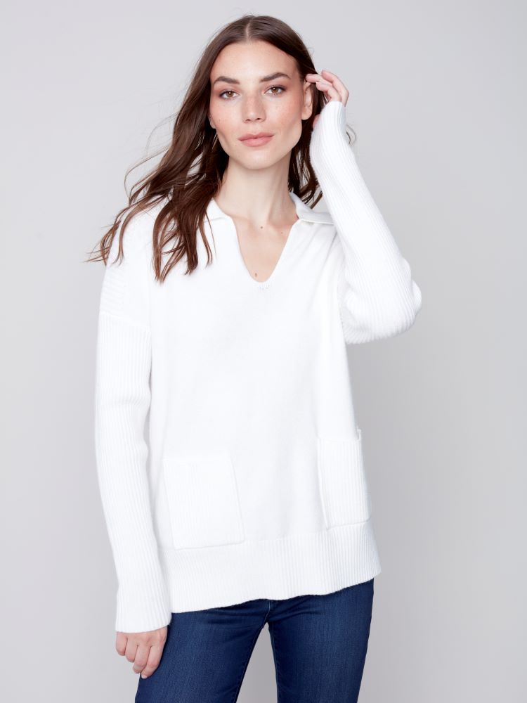 This chic and sophisticated Charlie B Sweater designed with a Johnny Collar and front pockets for extra practicality. Features an ideal balance of fashion and functionality. Wear it on its own or as a layering piece with vests, cardigans and shirt jackets.