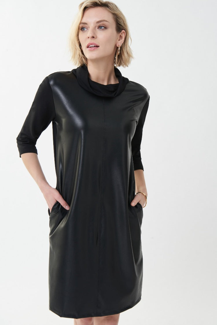 Show an edgy side in this Cowl Neck Pleather Dress from Joseph Ribkoff. This is a new LBD that features a classic cowl neck, 3/4 length sleeves and a pleather front. It gives you a great look that can be worn from day to night with fabulous heels or boots.  Proudly made in Canada.