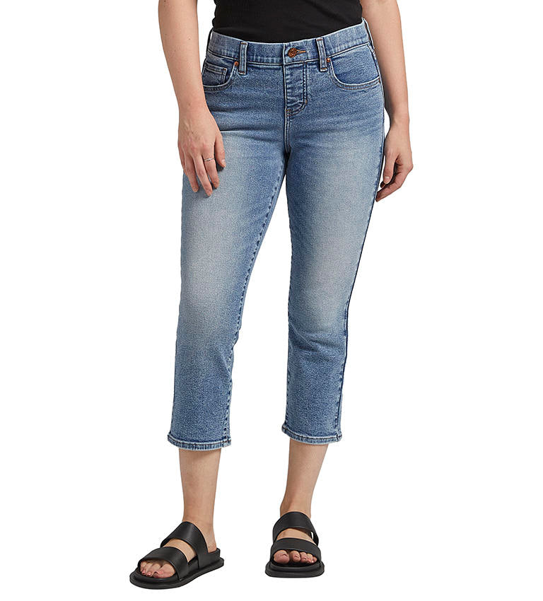 JAG Maya Capri  Love the ease of a pull-on jean but want a traditional look? Meet slim fitting, mid-rise Maya. This style's a modern pull-on with an elastic waistband plus a faux button and fly—so you can feel supported yet stylish. Last but not least, it's finished with lifting back pockets and a fun capri length.