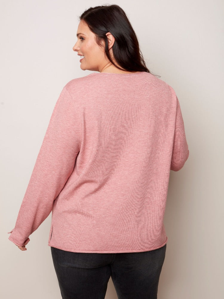Your look will be anything but basic with this Charlie B Plus Basic V-Neck Sweater! From your best skinny jeans to business slacks you can wear it with just about anything. Thanks to its soft, plushy yarn, the flattering V neck and versatility, it is sure to become one of your favourites.