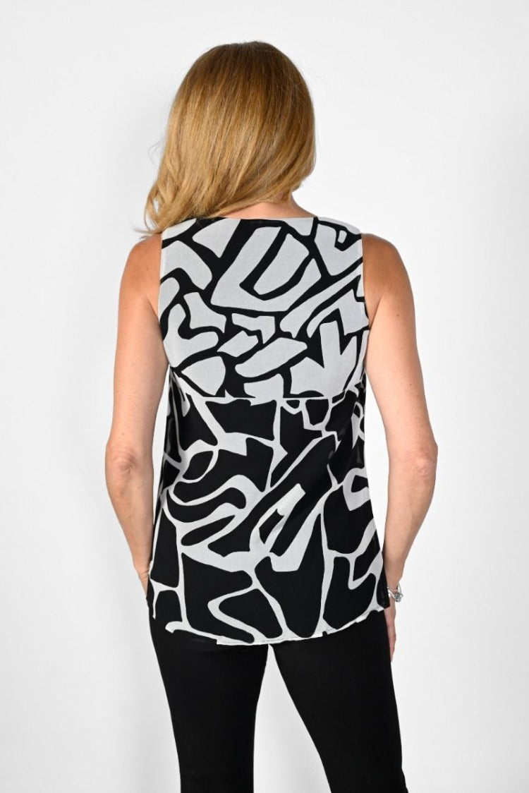 Frank Lyman Geometric Top  Style: 231398  A statement piece for a timeless wardrobe, the Frank Lyman Geometric Top features a bold geometric black and white design that fades from white to black, with a high back cut for a modern silhouette. Crafted with luxury and style in mind, this luxurious top is perfect for all occasions.  For best fit please refer to this size guide.