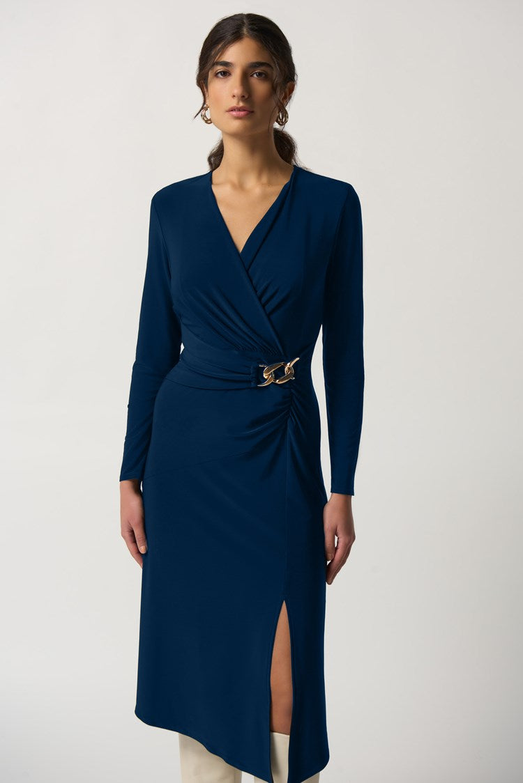 Leave an instant impression when you go out in this fabulous wrap dress from Joseph Ribkoff. Featuring a fit and flare silhouette with long sleeves, a wrap neckline and front slit for comfort and elegance. You will love how this provides you with a perfect day to night style.
