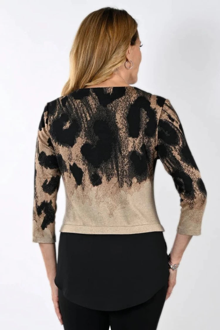 If you love having the layered look this Beige Abstract Print Layered Top from Frank Lyman is just for you. It gives you that look of having the perfect layered sweater over a button up all in one. You can pair it with a dark denim or contrast with a beige pant. 