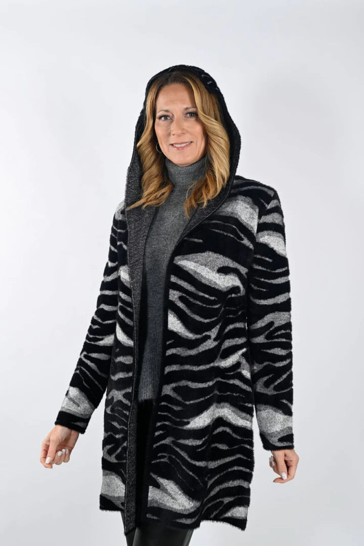 Cardigans are a perfect blend of comfort and style and the Zebra Print Hooded Cardigan from Frank Lyman gives you all that and more. The beautiful print is a perfect choice to finish off both casual and classic looks.