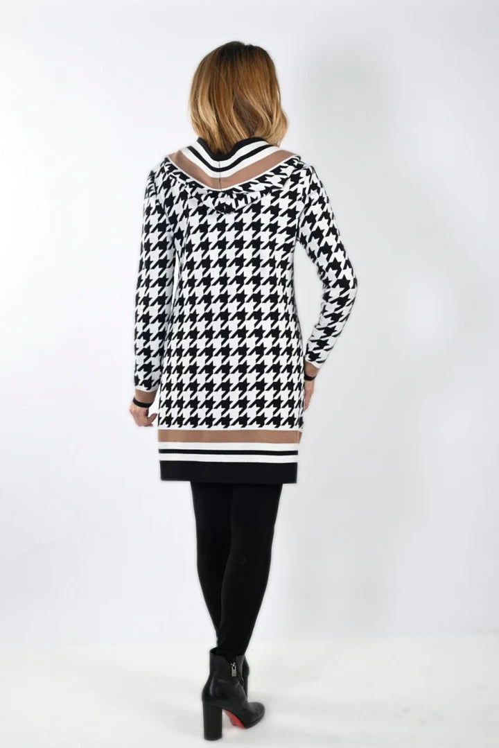 Give yourself the feeling of being both chic and bold in the Frank Lyman Houndstooth Hooded Cardigan. The large houndstooth print capped off with thick, bold stripes is the perfect combination of drama and style to top off your outfit for any day. 