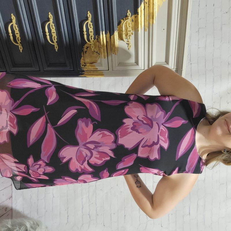 Perfect for any occasion, this Frank Lyman Sleeveless Dress with Floral Overlay is a graceful elegant choice. Its rounded neckline and sheer overlay create a fit that is flattering, and its stunning rhinestone detail adds an extra touch of sophistication for you. 