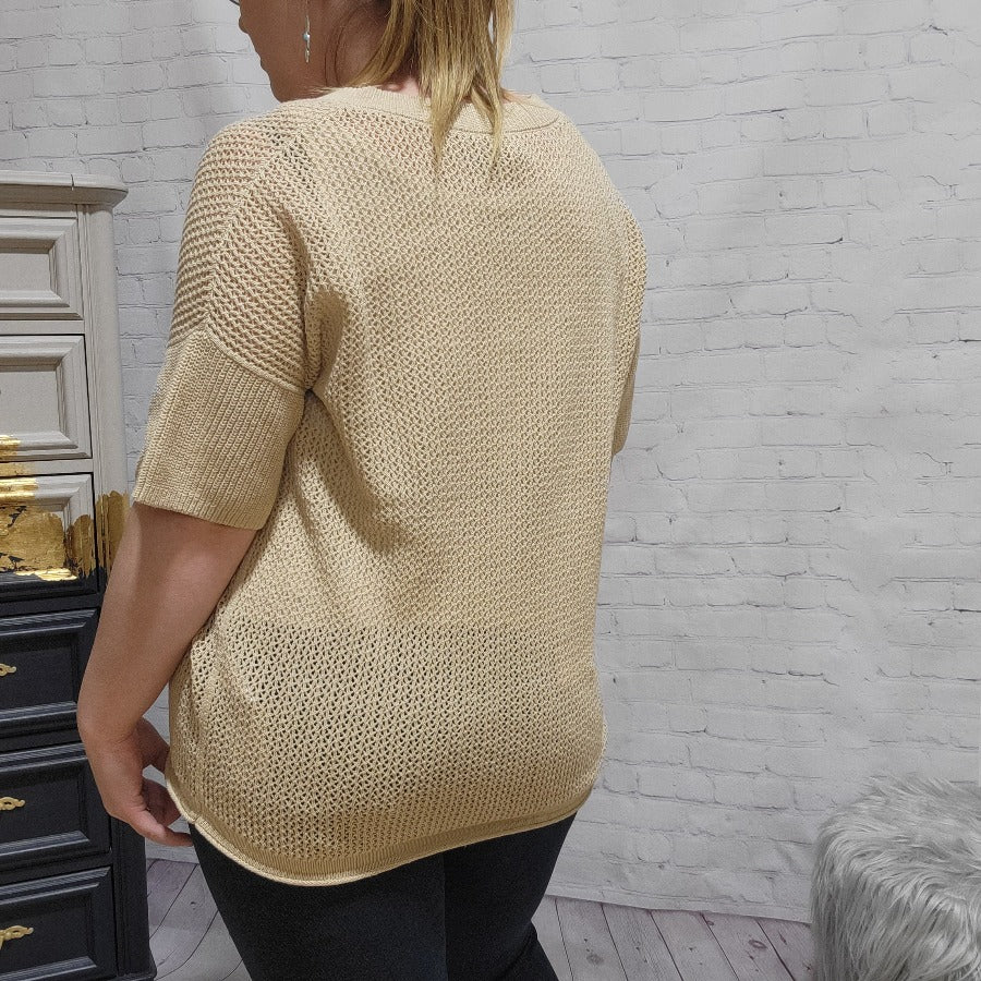A easy look for this season is this open knit Soya Concept Laurette sweater. With its short sleeves and hip length that allows for a tucked or loose look it is a winner paired with a jean for that casual look or with a flowy trouser to have a dressier touch. 
