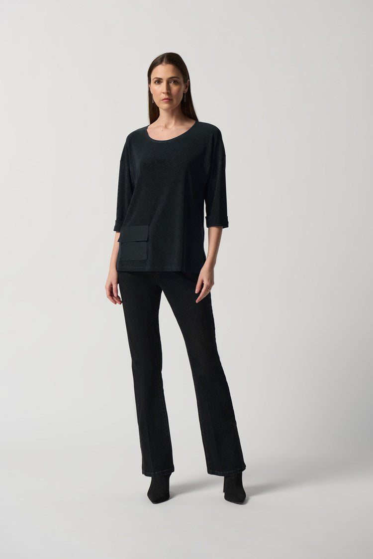 This lovely Joseph Ribkoff Dolman Sleeve Boxy Top is made in a smooth woven fabric creates this silky knit top. Intentional design features include boxy silhouette, three-quarter dolman sleeves and folded cuffs. A practical side pocket rounds out the look that is perfect to wear dressed up or casual with jeans.