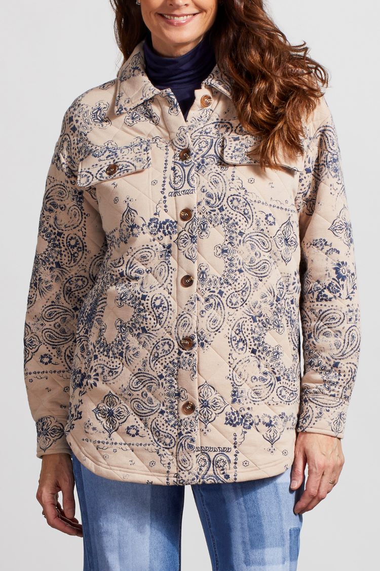 The Tribal Quilted Printed Shacket is a must-have item for your wardrobe this season. This shacket is made of a lightweight quilted fabric with a print design that will add a unique, stylish look to any outfit. The shacket is perfect for layering over a blouse or T-shirt for a chic, modern look. 