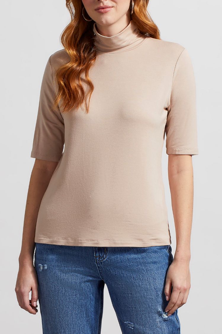 The Tribal Mock Neck Elbow Sleeve Top gives you versatile style mixed with comfortable all day wear. It is an excellent option for when you need something casual but still want to make an impression!