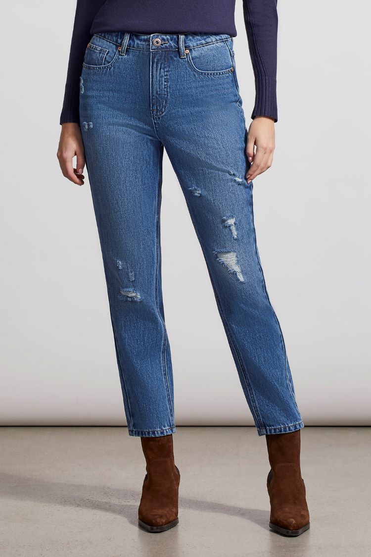 The Tribal Distressed Brooke Girlfriend Ankle Jeans are a stylish and comfortable choice for your everyday style. Featuring a distressed look and tapered leg, you will have a flattering and fashionable fit that is easy to style with a blouse and shacket or tee and cardigan.