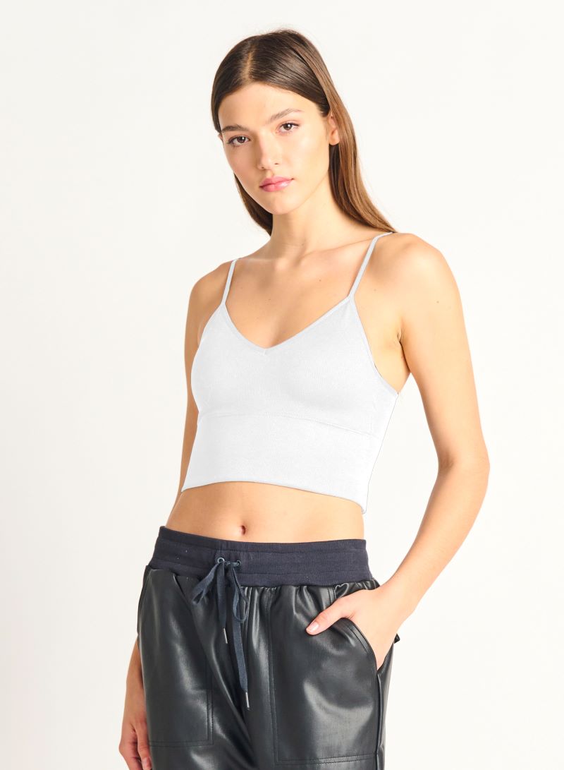 The Dex Seamless Bra Top is an essential must have for your wardrobe! Featuring removable padded cups, adjustable straps, and stretchy ribbed fabric it gives you comfort and coverage. Perfect to layer with for your favourite casual looks.