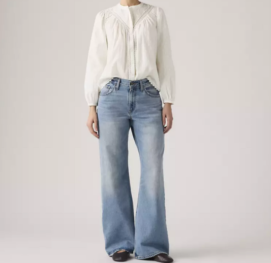 Levi's Loose Boot women's jeans at  Medium-wash non-stretch denim with a relaxed fit and modern bootcut leg. 
