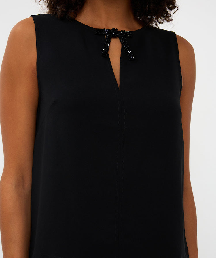 Sleeveless Blouse With A Sequin Bow Detail