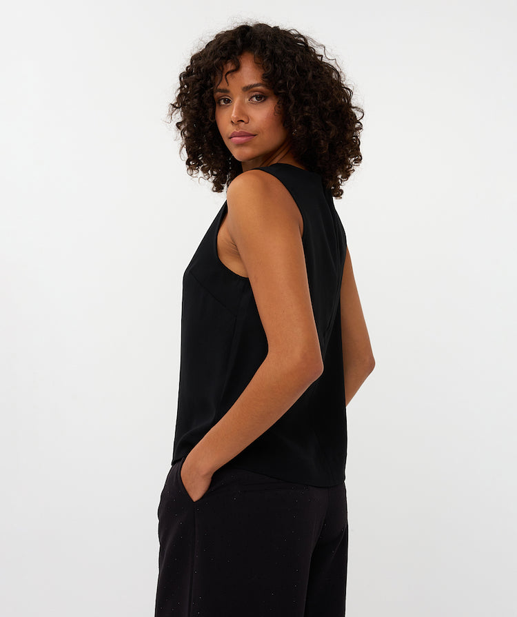 Sleeveless Blouse With A Sequin Bow Detail