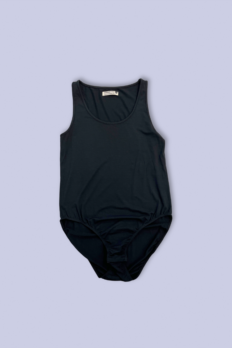 Jackson Rowe Tucker Tank Bodysuit  Style: MD1030-BLK  The Tucker Tank Bodysuit from Jackson Rowe is a wardrobe essential that makes you look chic and feel comfy. Made from a luxe blend of Rayon Modal and Spandex, this classic silhouette is sure to flatter your shape. Best of all, you can toss it in the wash and lay it flat to dry - no fuss, no muss! Who said looking great had to be complicated?  For best fit please refer to this size guide.