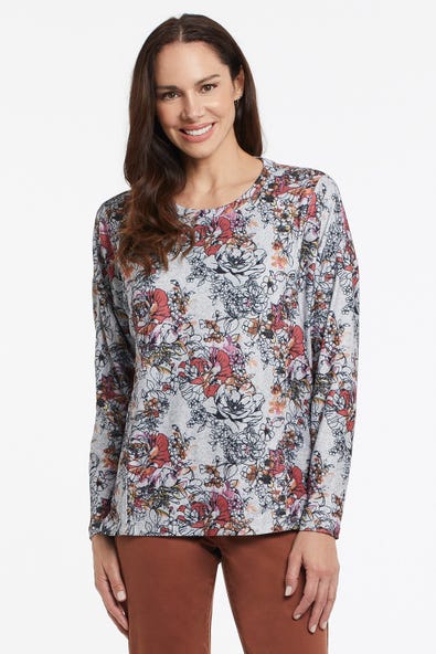 This brushed knit Tribal Long Sleeve Crew Neck Print shirt has a relaxed fit, drop shoulder, and cute side slits in a choice of pretty prints.  Just what you want when you're getting dressed on chilly days that call for comfort and style.