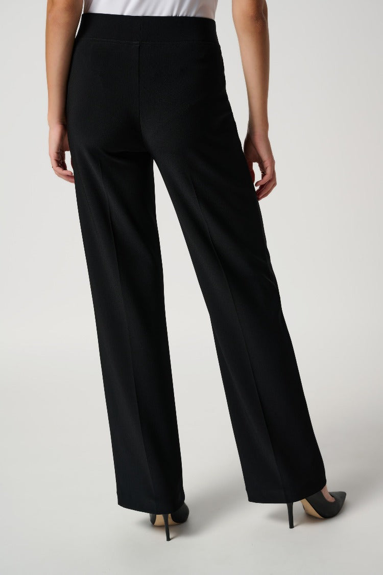 The mid-rise Joseph Ribkoff Pull-on Pant style features a wide, straight-leg, and an elasticized waist. The comfortable fit also gives you a lovely silhouette that will look great with a blouse and even toss on a blazer or cardigan with it.