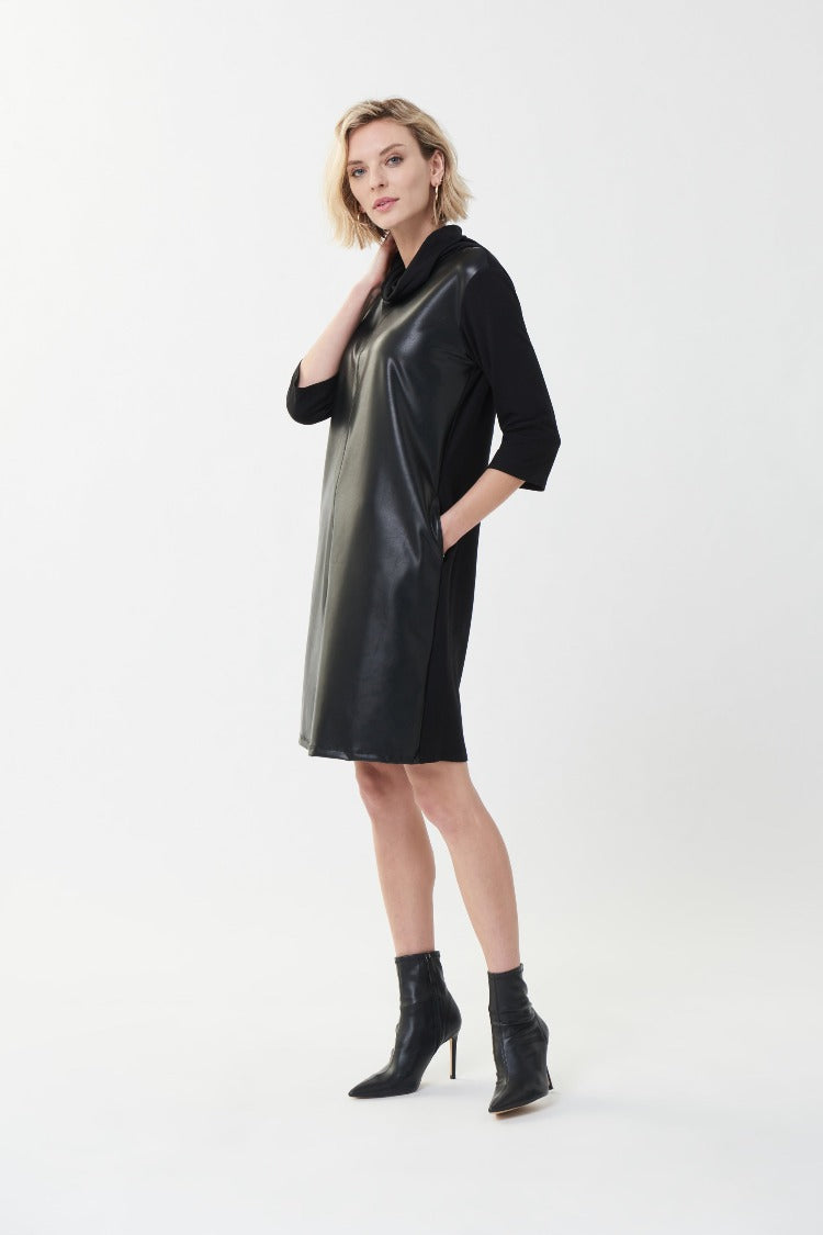 Show an edgy side in this Cowl Neck Pleather Dress from Joseph Ribkoff. This is a new LBD that features a classic cowl neck, 3/4 length sleeves and a pleather front. It gives you a great look that can be worn from day to night with fabulous heels or boots.  Proudly made in Canada.