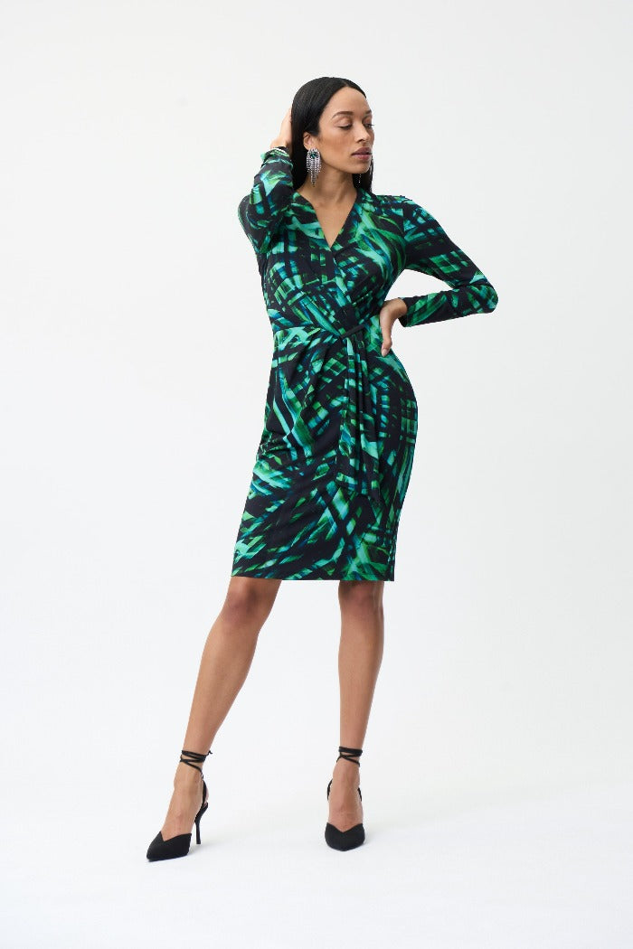 Joseph Ribkoff Printed Wrap Dress   Go for a bold statement with this Joseph Ribkoff Printed Wrap Dress. The abstract printed wrap dress is as comfortable as it is beautiful. With its long sleeves and mid-length and pleats detailing the waist, wearing this is sure to give you a mood boost for any o