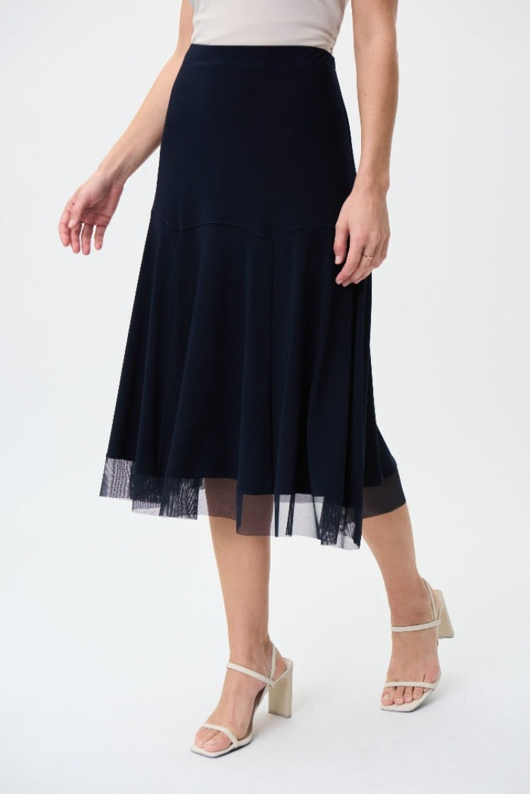 Let your inner child out to play with this Joseph Ribkoff Chiffon Skirt. Its chiffon overlay gives a beautiful flowy movement that you will not want to stop. Perfect to go dancing in, even if it's just down the hall.