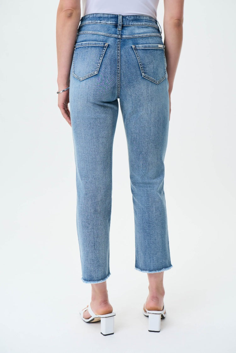 The fabulous mid-rise fit of the Joseph Ribkoff Frayed Jeans will give you a new favourite to wear. Featuring a straight crop, flattering frayed hem and classic five-pocket style makes them a timeless piece that you will wear time and again.