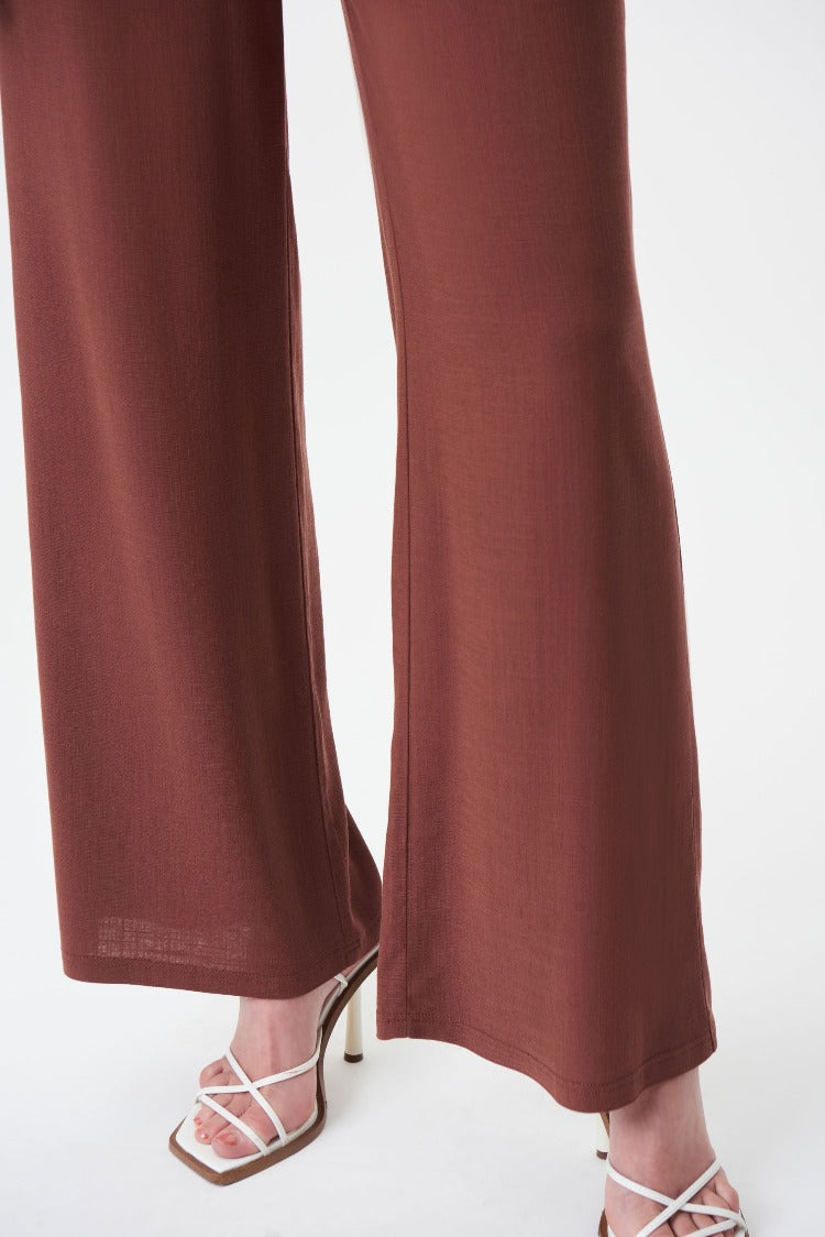 Joseph Ribkoff Wide Leg Pant  Style: 232105  Though these Joseph Ribkoff pants have a distinctly casual feel, they're very much a workplace-appropriate style, thanks to elegant wide leg cut and high-rise fit. Beautiful with anything, but especially paired with a blouse, tee, or camisole.  97% Viscose Rayon 3% Spandex. For best fit please refer to this size guide.