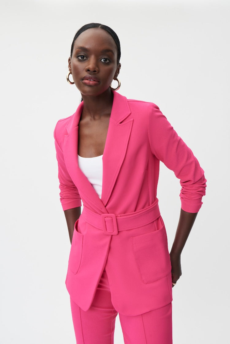 Joseph Ribkoff Belted Blazer Style: 232172  This easy-to-wear blazer will pull any outfit together. Cut from a luxurious silky knit fabric with a slightly longer hemline in a straight fit, this blazer is a fabulous addition to any wardrobe. This chic blazer also has a notched collar, long sleeves, two front pockets, and a front button closure.  