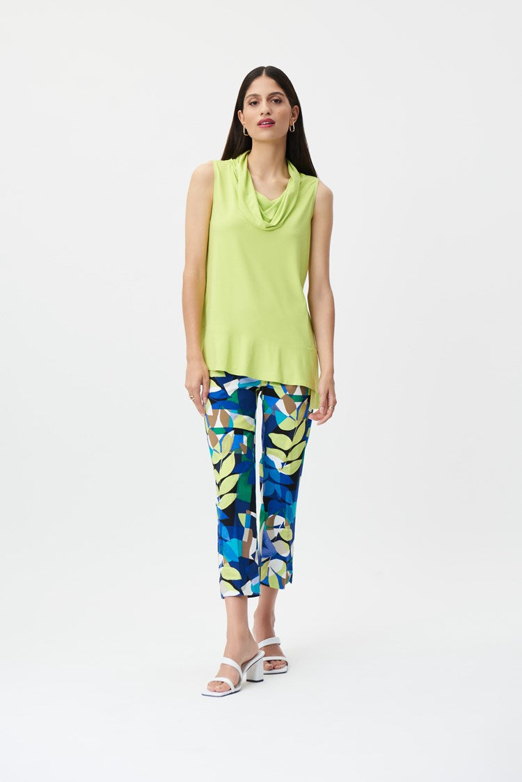 Made from a lightweight, breathable fabric, these cropped pants from Joseph Ribkoff are perfect for a day in the sun. The allover tropical print is sure to turn heads, while the covered elastic waistband provides a comfortable, secure fit. The small slit at the bottom of each leg provides a bit of ventilation, keeping you cool and comfortable all day long.