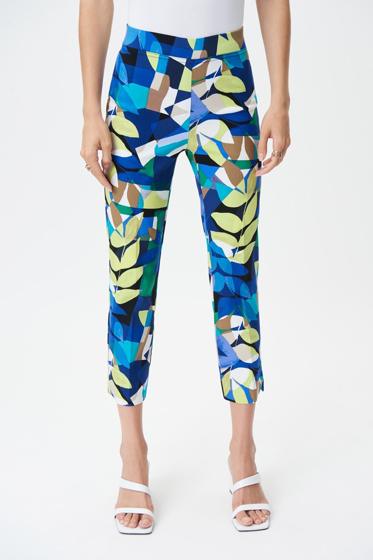 Made from a lightweight, breathable fabric, these cropped pants from Joseph Ribkoff are perfect for a day in the sun. The allover tropical print is sure to turn heads, while the covered elastic waistband provides a comfortable, secure fit. The small slit at the bottom of each leg provides a bit of ventilation, keeping you cool and comfortable all day long.