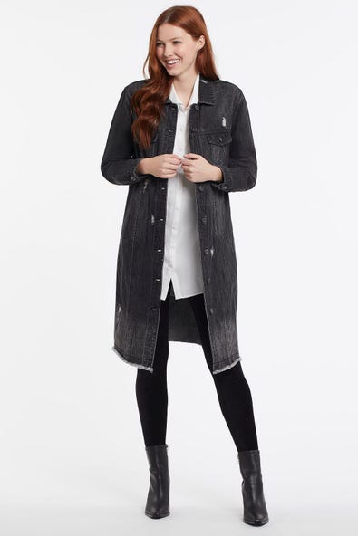 The Tribal Long Denim Duster is an exceptional updated twist on a classic jean jacket.  With details like the button-front closure, decorative chest pockets, side seam pockets, frayed hem, and subtle distressing will give you a chic casual look.