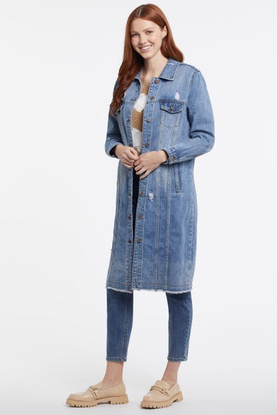 The Tribal Long Denim Duster is an exceptional updated twist on a classic jean jacket.  With details like the button-front closure, decorative chest pockets, side seam pockets, frayed hem, and subtle distressing will give you a chic casual look.