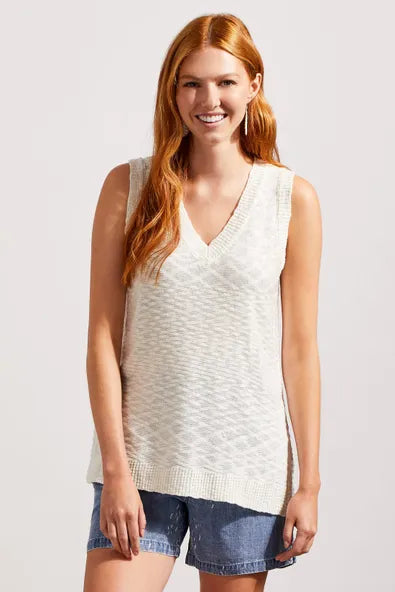 Tribal Side Slit Sleeveless Tunic  This little showstopper From Tribal features a v-neckline, side slits at the hem, and ribbed trim that outline the edges. The lightweight yarn makes it a versatile option for wearing on its own during warm weather or layering it over your favorite long sleeve.