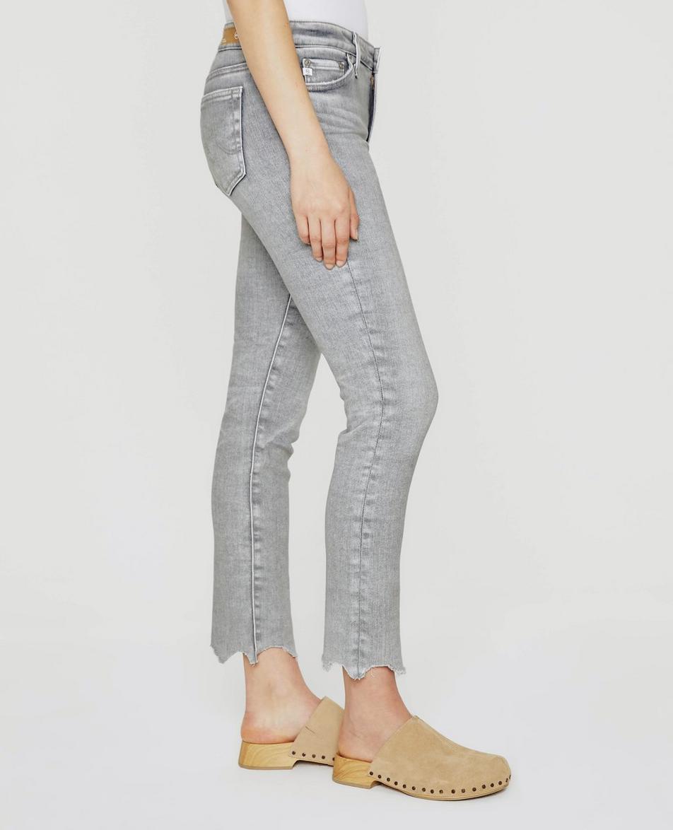 AG Mari Crop Jeans  The Mari Crop is crafted offers a high-rise straight leg design, a slim cropped leg opening, and a waist-hugging fit. To minimize environmental impact, our Vapor Wash process is used, reducing water, chemical, and energy consumption. To complete, a vegan and biodegradable cellulose patch is added at the back waistband.