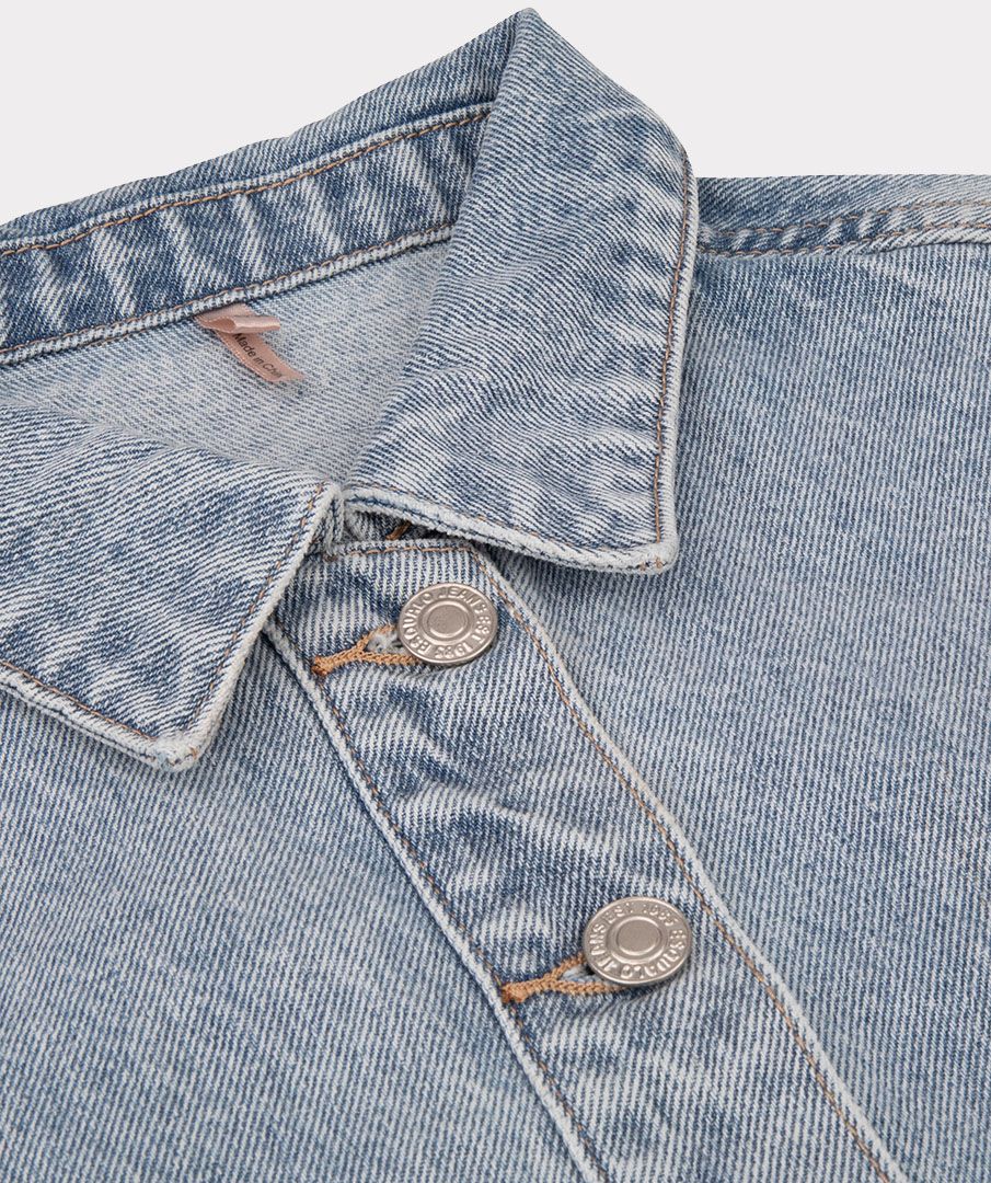 This light blue Esqualo Jean Jacket features that denim style we love, but with button flap pockets near the waist instead of on the chest.