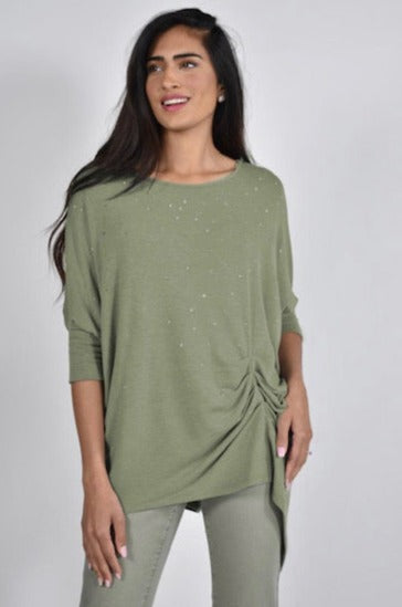 Frank Lyman Rhinestone Dolman Top  Show off your sparkle in this Frank Lyman Rhinestone Dolman Top! This exquisite top features a round neckline with rhinestones, dolman sleeves and a classy front gathered detail. Suitable for work or an evening out. Proudly made in Canada.