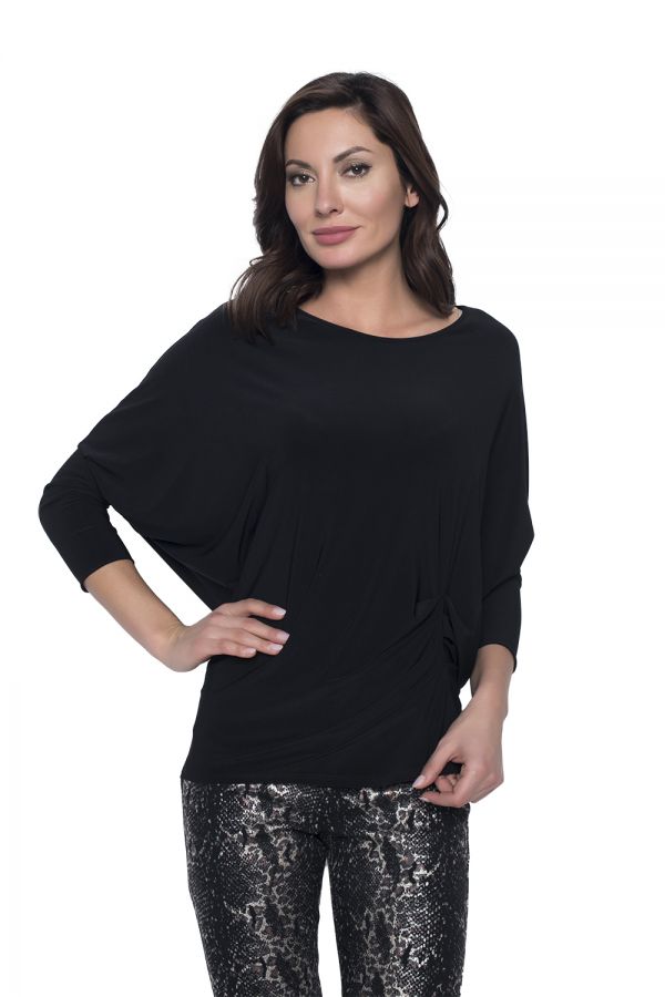 Frank Lyman Knit Tunic  This Frank Lyman Knit Tunic is a classic piece you can wear for all sorts of occasions - from work to play and everything in between. This beautiful top features a boat-style neckline, dolman sleeves and an elegant gathered detail at the front. Proudly made in Canada.