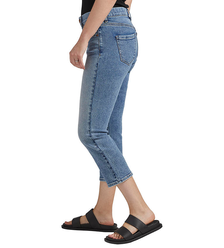 JAG Maya Capri  Love the ease of a pull-on jean but want a traditional look? Meet slim fitting, mid-rise Maya. This style's a modern pull-on with an elastic waistband plus a faux button and fly—so you can feel supported yet stylish. Last but not least, it's finished with lifting back pockets and a fun capri length.