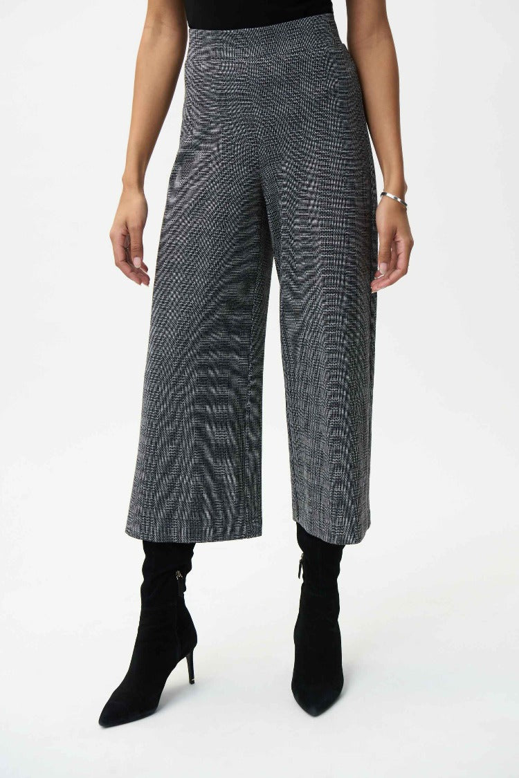 Wide leg pants like these Cropped Pants from Joseph Ribkoff are a timeless, comfortable choice for your busy workday and beyond. These are cut in a classic plaid print and have a pull-on, high-rise design with a shorter length that's perfect for showing off your boots. 