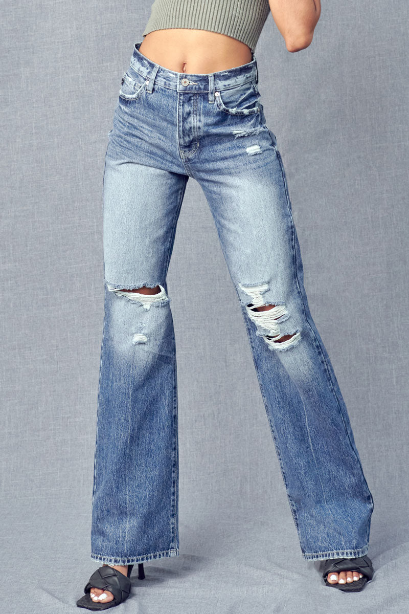 ﻿Kancan's Lydia Ultra High Rise Flare Jeans feature a retro wide leg, a 5 button fly, medium blue wash and distressing. Rigid denim.