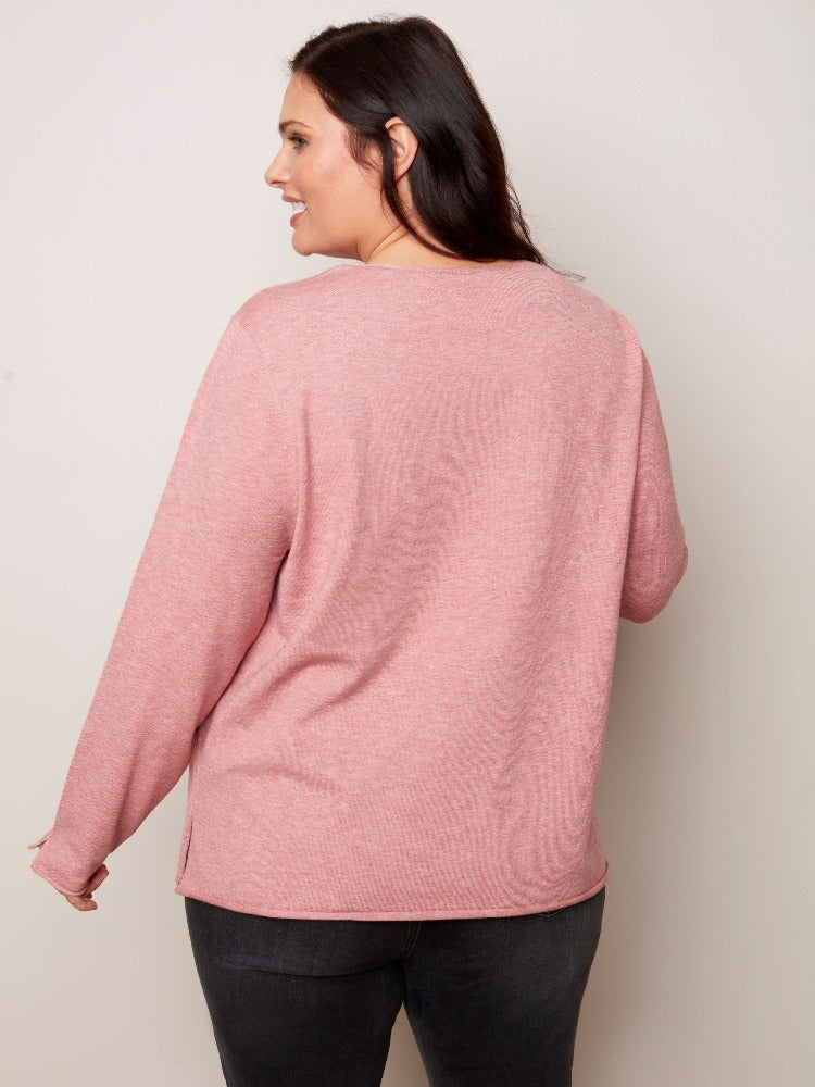 Your look will be anything but basic with this Charlie B Plus Basic V-Neck Sweater! From your best skinny jeans to business slacks you can wear it with just about anything.  Thanks to its soft, plushy yarn, the flattering V neck and versatility, it is sure to become one of your favourites.  