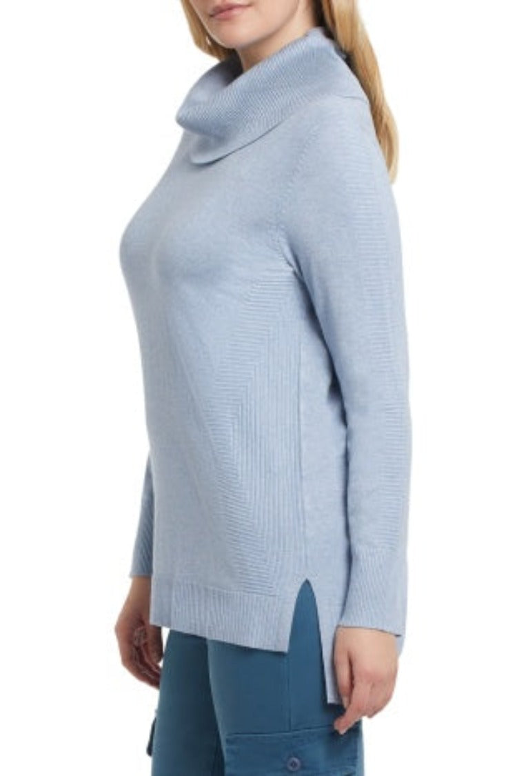 This Tribal Long Sleeve Cowl Neck Sweater is a stylish basic for the season.  The cowl neck, relaxed silhouette, long sleeves, and side slits makes this a fabulous layering piece you will be excited to wear on repeat.  