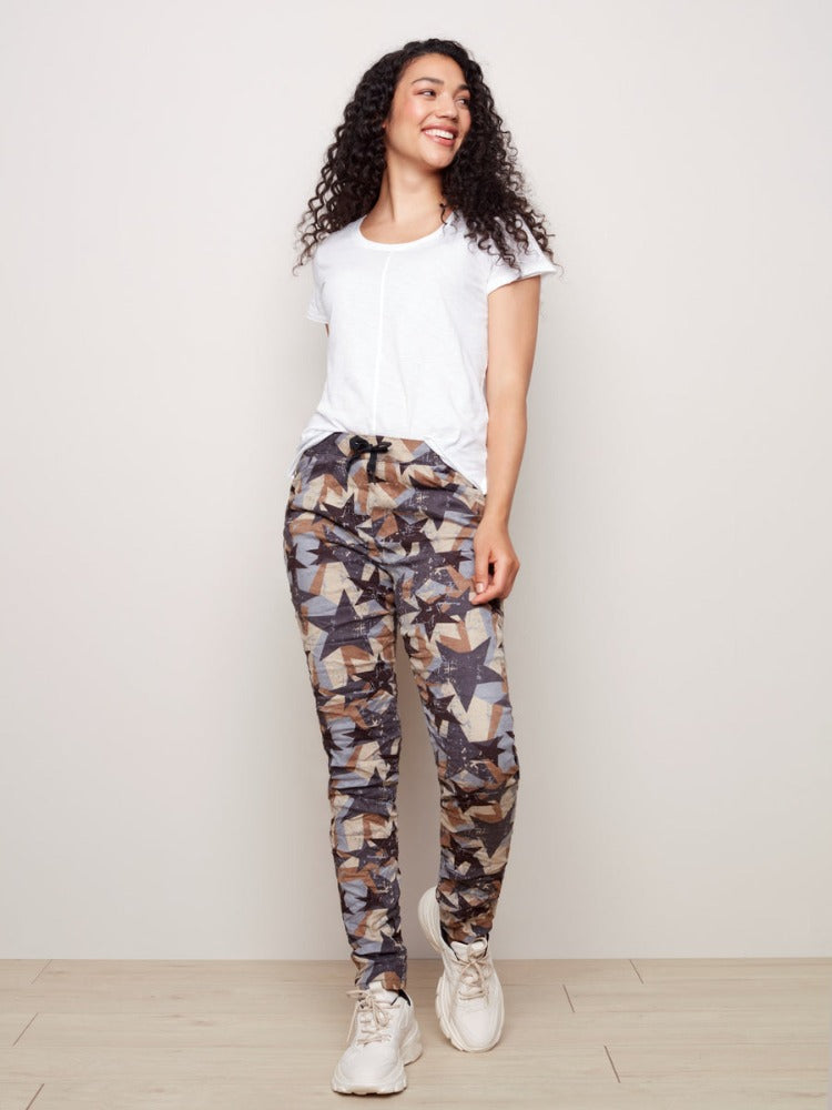 These Crinkle Joggers from Charlie B are a fun way to add colour and texture to your closet. These feature an elastic waistband with drawstring, front and back pockets, an eye-catching pattern and faux-suede feel.