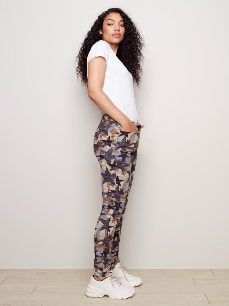 These Crinkle Joggers from Charlie B are a fun way to add colour and texture to your closet. These feature an elastic waistband with drawstring, front and back pockets, an eye-catching pattern and faux-suede feel.