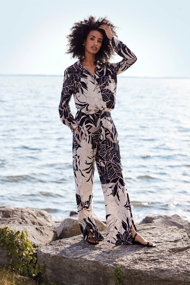 Slip into effortless style with these Floral Printed Pants from Joseph Ribkoff. These pants feature an elastic waist and are cut in a comfortable wide leg. Beautiful with your favourite sandals!