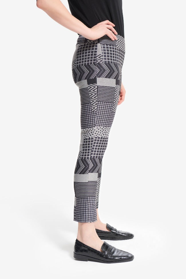 These Joseph Ribkoff Graphic Pants are fun and eye-catching with a dramatic abstract print and cropped fit. Super stylish with patent loafers and a neutral top!