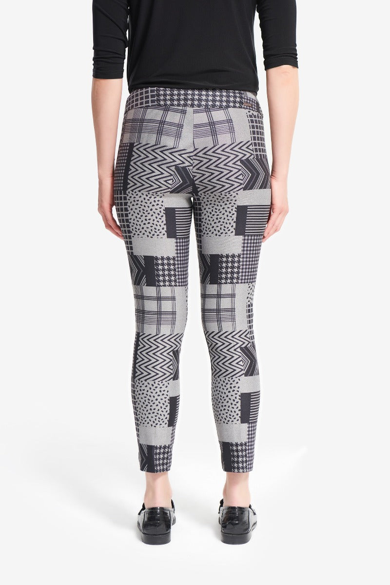 These Joseph Ribkoff Graphic Pants are fun and eye-catching with a dramatic abstract print and cropped fit. Super stylish with patent loafers and a neutral top!