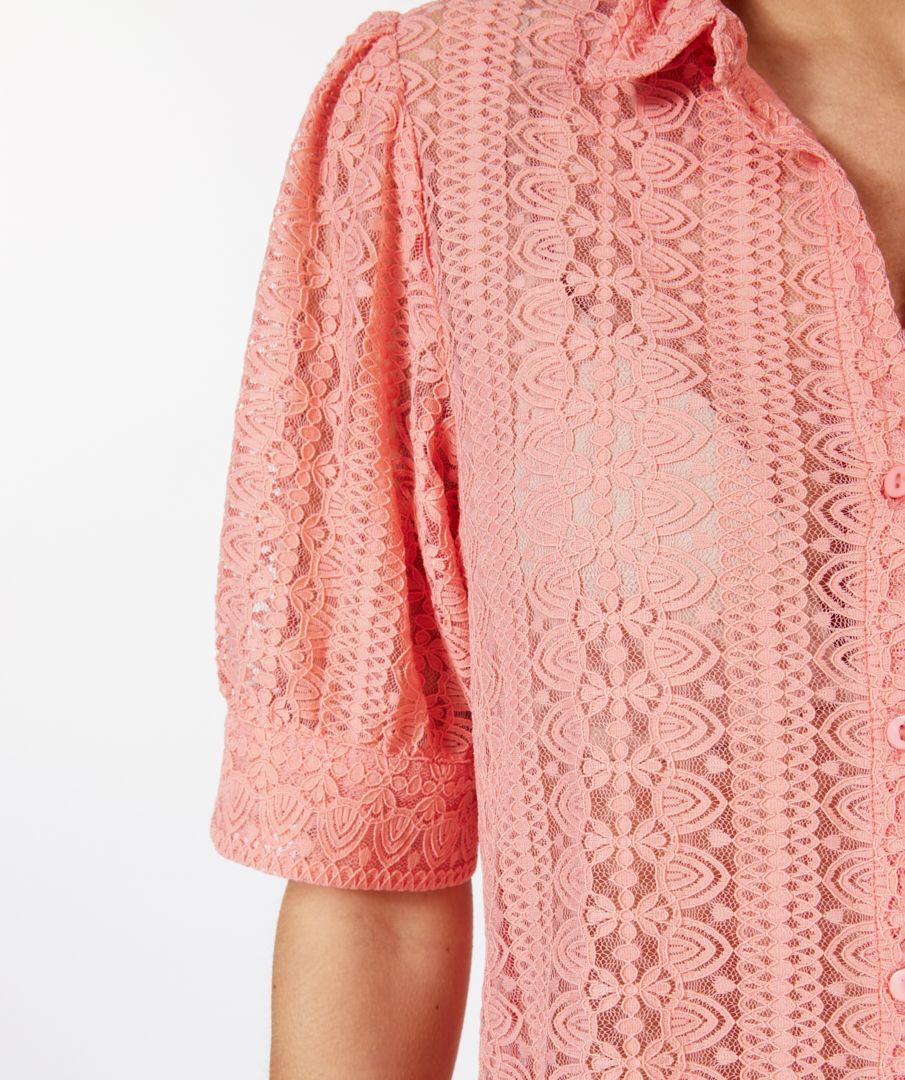 Esqualo Short Sleeve Lace Blouse  This Esqualo Lace blouse has a great look with short puff sleeves. This will be a favourite for you to wear with a denim pant or skirt for a casual look.  You can also dress it up for your day at the office. 
