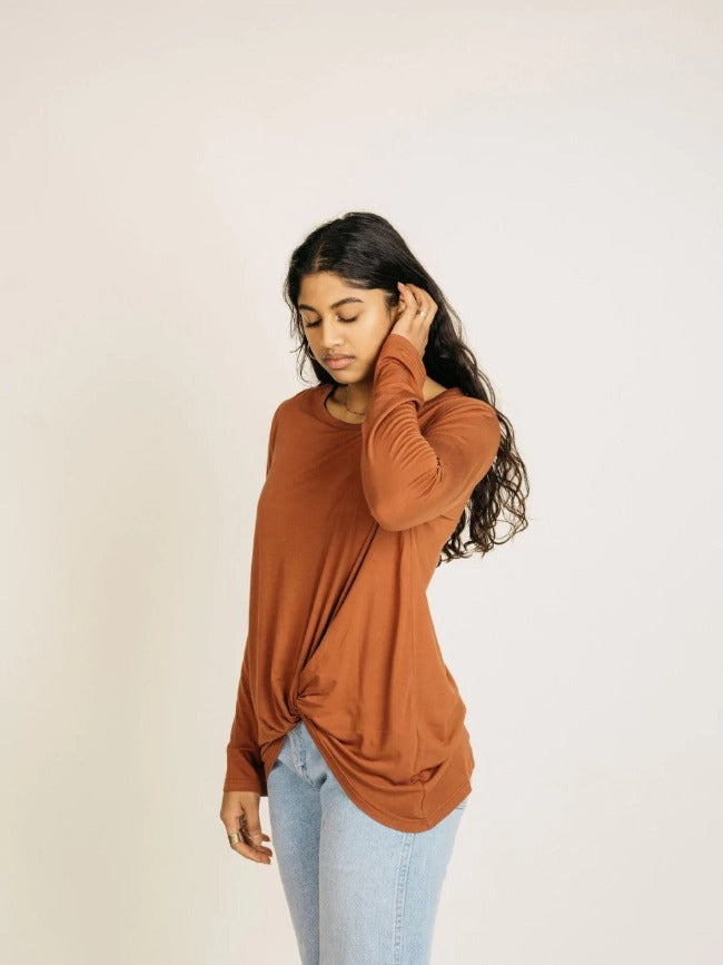 Jackson Rowe Knotty Long Sleeve Tee  No need to French tuck when you have knotty tee doing the work for you. Get the classic half tuck look with a cute and functional knot detail on the lower hem. This shirt is super soft and comfy in a stretchy and durable curve hugging fabric. This will be your go to winter t-shirt.  Style # MD3533